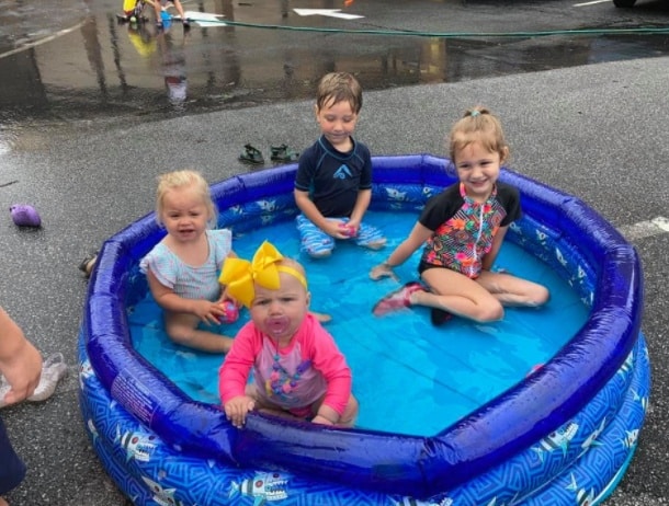 Moms and children enjoying a playdate event through MOMCo.