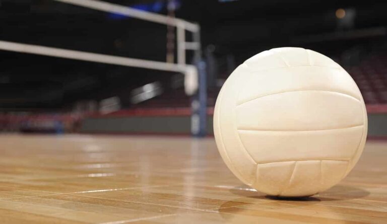 College students enjoying Open Volleyball at the Gathering Center.