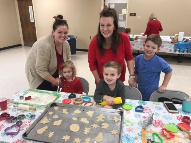 Moms connecting and sharing fellowship at a MOMCo group event.