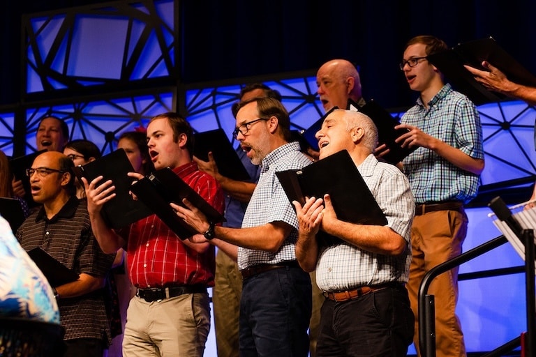 Worship choir and musicians leading praise at Kennesaw First Baptist Church.