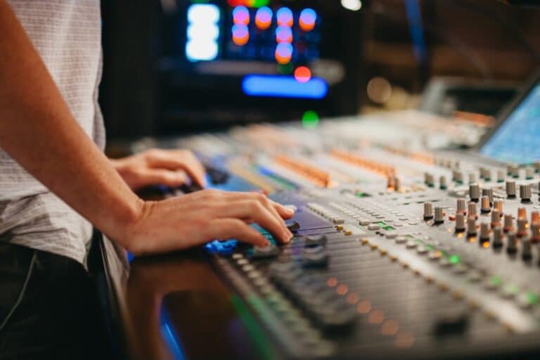 Tech Team managing audio, video, and lighting during a worship service at Kennesaw First.